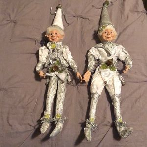 Silver elf’s.18 inches from top hat to heel.Porcelain face,hands.Bendable